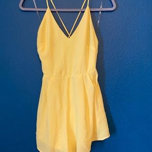 Yellow romper with pockets!